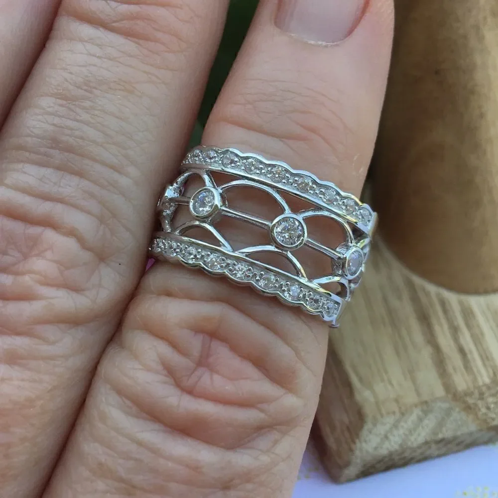 Wide sterling silver CZ cage ring 8
